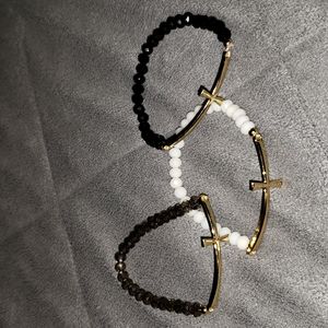 Set of 3 , cross stretch bracelets. New in box